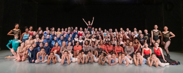 A large group of dancers posing for a photo at Peridance Studios in NYC.